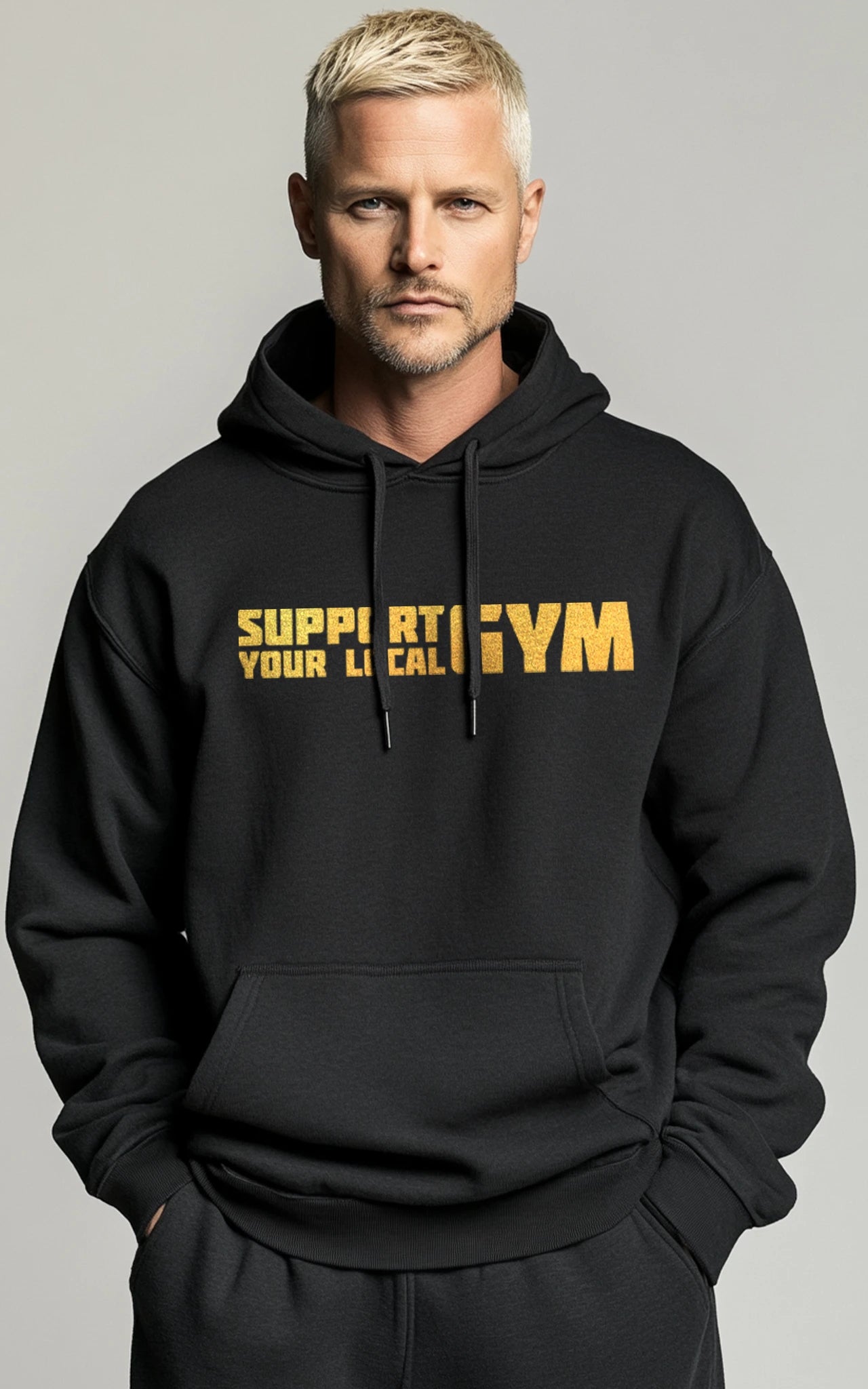 Support Your Local Gym Premium Hoodie - Schwarzer Kapuzenpullover mit goldenem Statement Frontprint